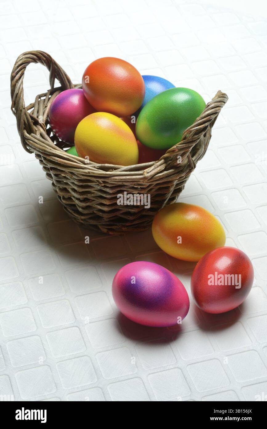 Colourful Easter eggs in baskets, Easter, Easter egg hunt Stock Photo