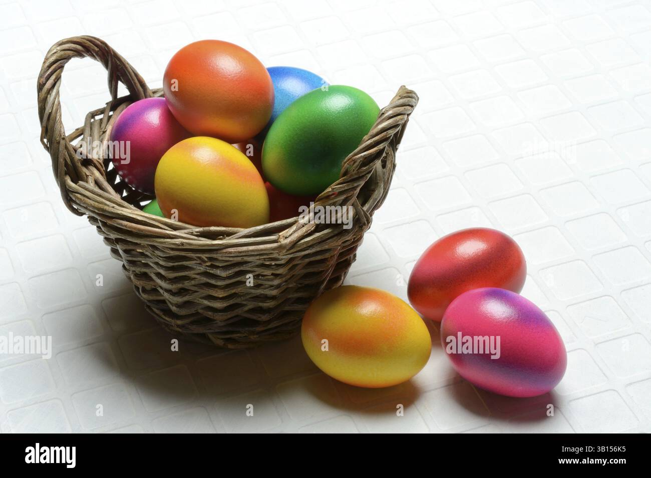 Colourful Easter eggs in baskets, Easter, Easter egg hunt Stock Photo