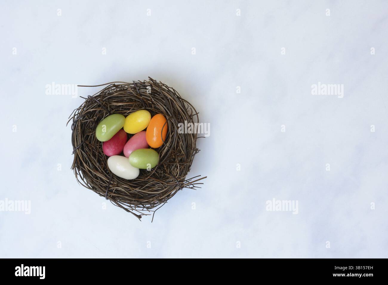 Easter nest, nest with sugar eggs Stock Photo