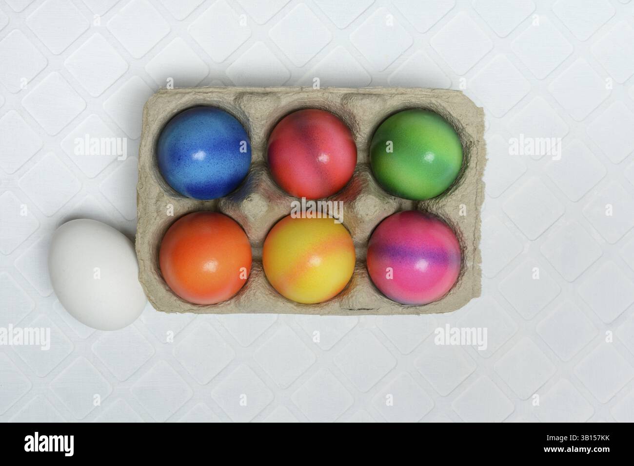 Colourful Easter eggs in packaging, dyed eggs Stock Photo