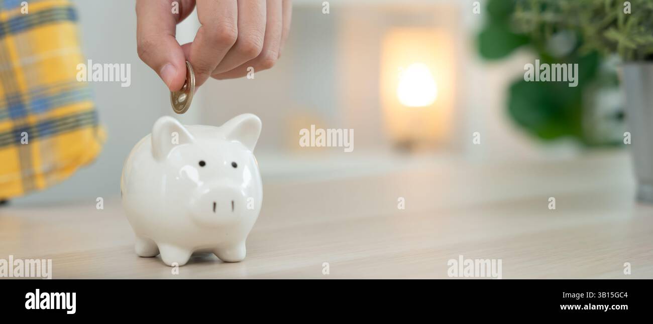Save money. business woman putting coin into piggy bank for saving ...