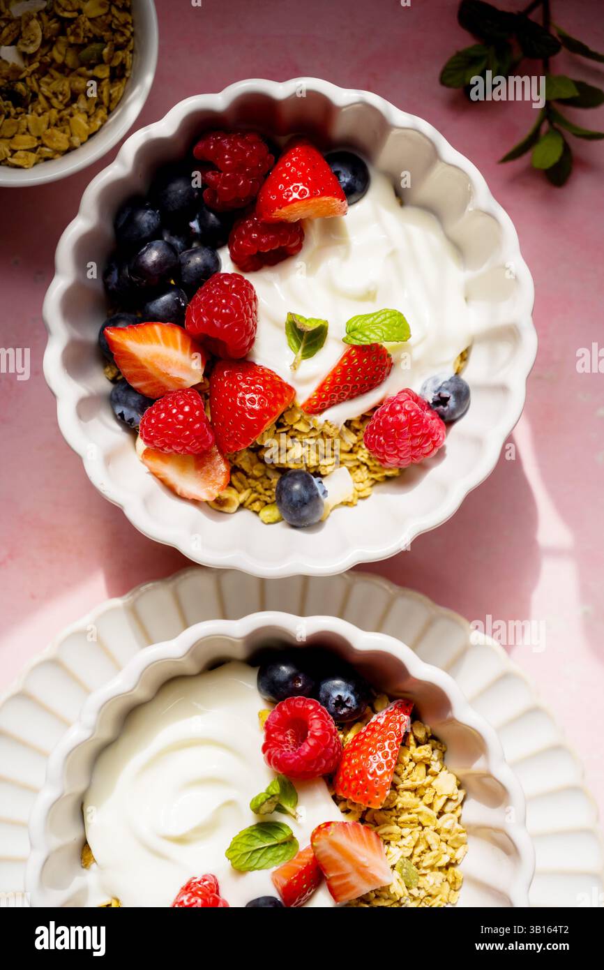 Yougurt bowl with granola and berries healthy protein breakfast Stock Photo