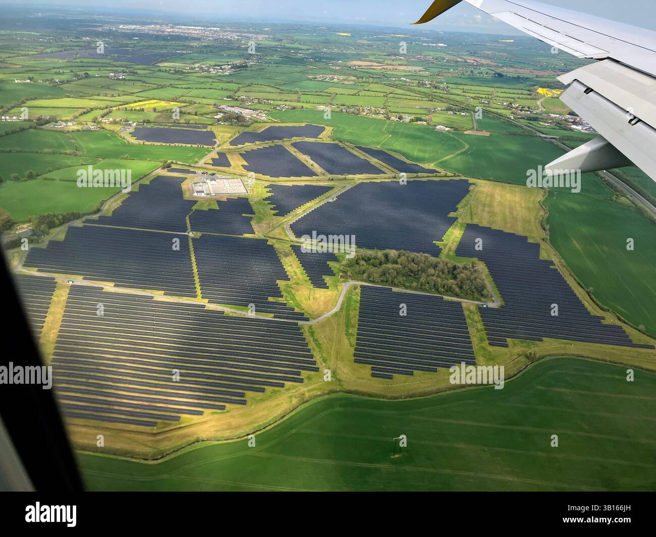 Solar Energy Electricity Generating Panels In Field Near Dublin Airport 