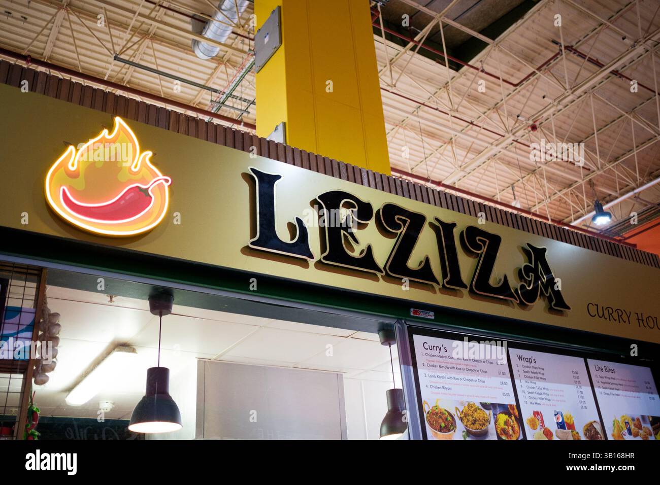 Leeds England: 3rd June 2024: Leeds Kirkgate Market Foodhall Leziza seeling flavourful Indian dishes Stock Photo