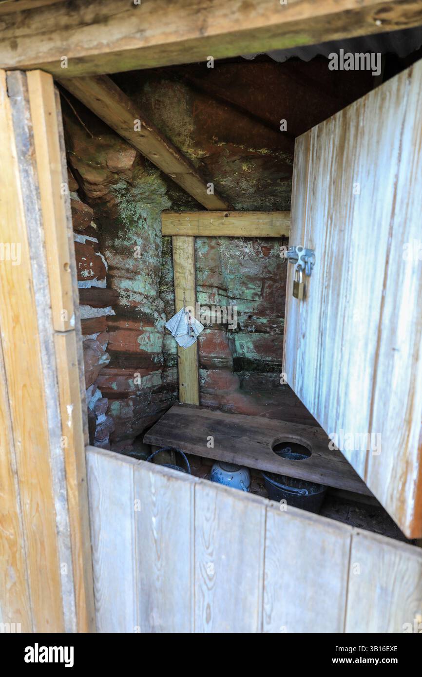 An earth closet, lavatory, or toilet inside the rock houses or cave houses at Kinver Edge, Staffordshire, West Midlands, England, UK Stock Photo