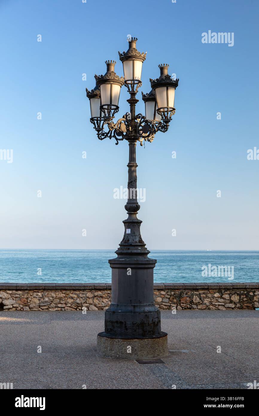 Old ornate street light, Sitges, Spain. Stock Photo