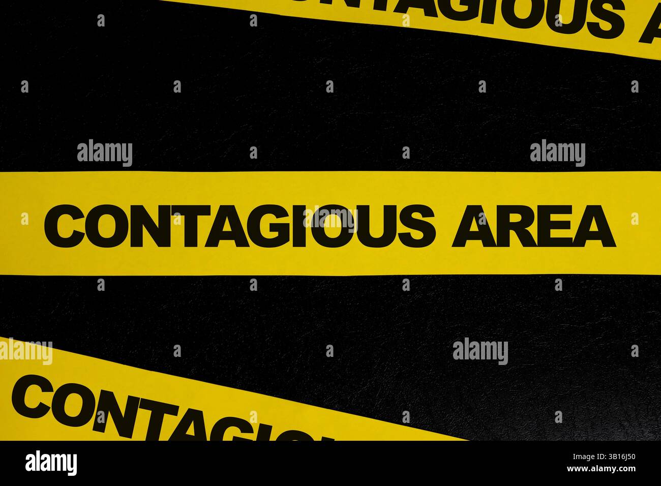 Contagious area and infectious  disease caution, danger and warning concept. Yellow barricade tape with word in dark black background. Stock Photo