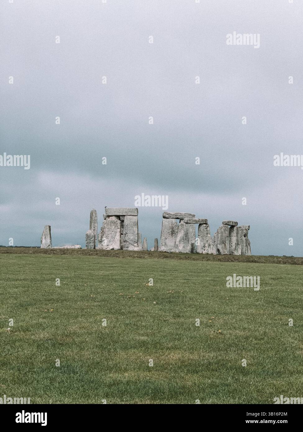 Moody Stonehenge with Dramatic Sky – Ancient Stone Circle in Atmospheric Light - Smartphone Captured Stock Image