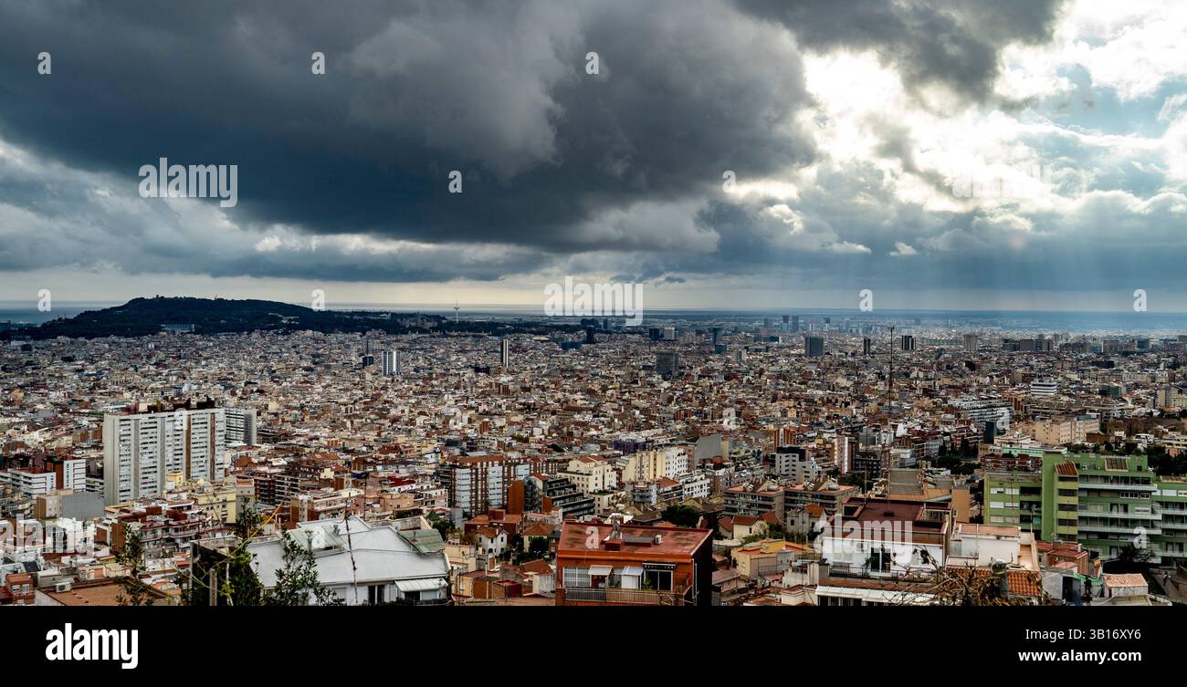 A panoramic view of a sprawling city under a dramatic sky filled with ... - Sprawling City And Landmarks Below