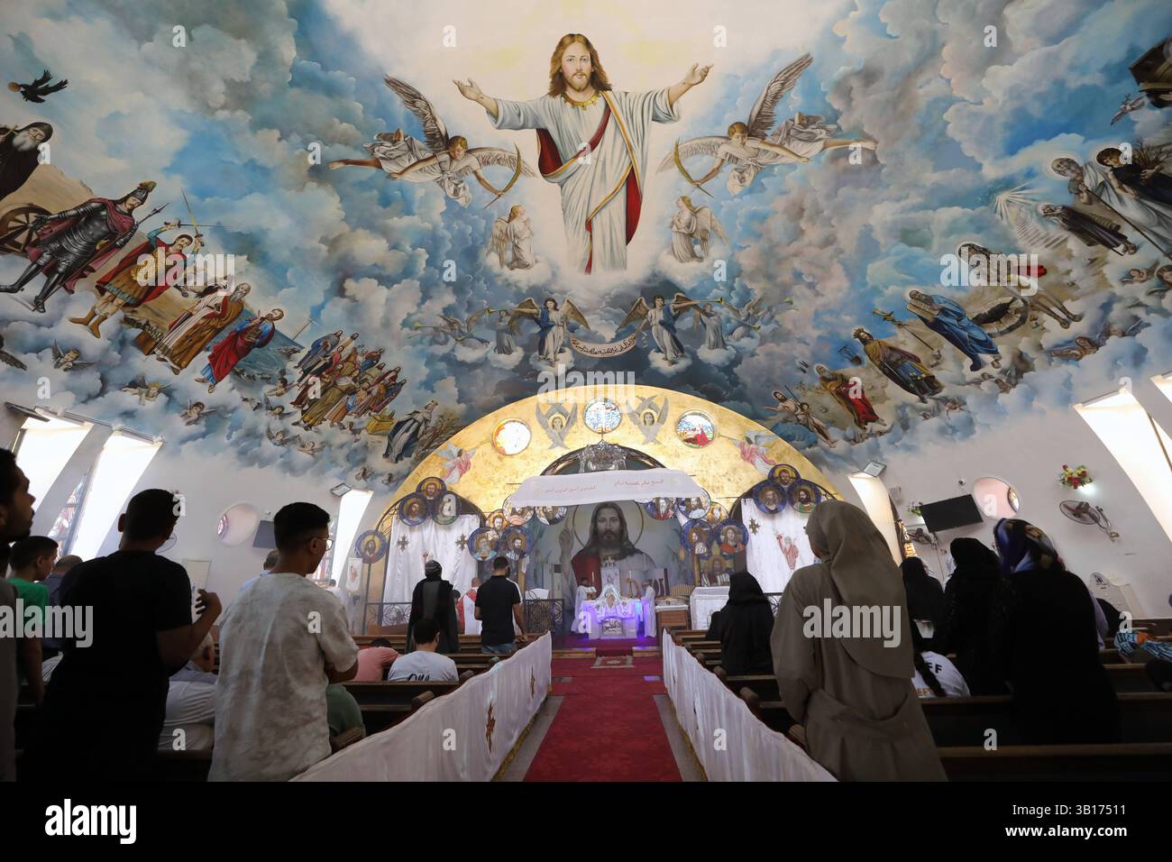 Mass baptism ceremony in Egypt Coptic prayer during a mass baptism ceremony inside Orthodox church at the Monastery of Patmos, ElShorouk city Cairo in Egypt, on April 25 2025. Cairo Egypt Copyright: xMatrixxImages/KhaledxElfiqix Stock Photo