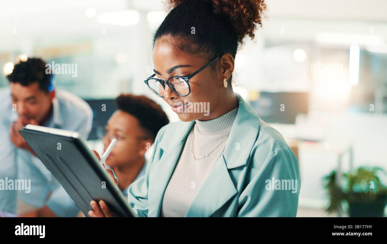 Programmer, woman and happy with tablet in office for writing code, web development and system maintenance. Programming, person and testing app with Stock Photo