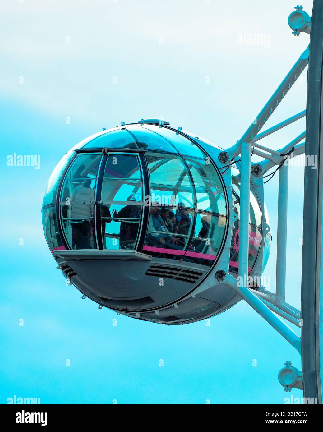 Passengers enjoy a ride in a pod on the London Eye Ferris wheel against ...
