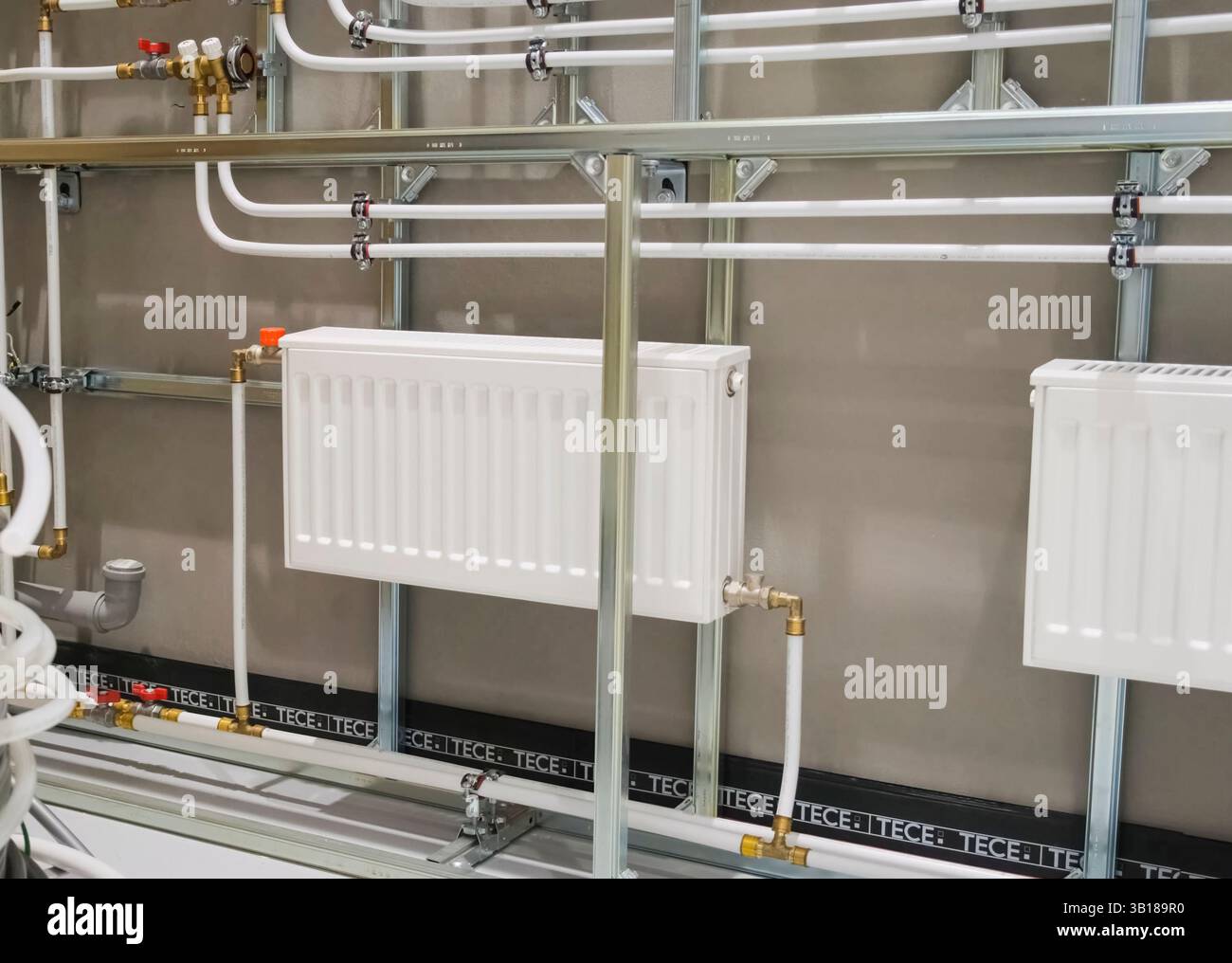 Model Radiator Installtion Heating radiators in a private house. installation of new radiators ...