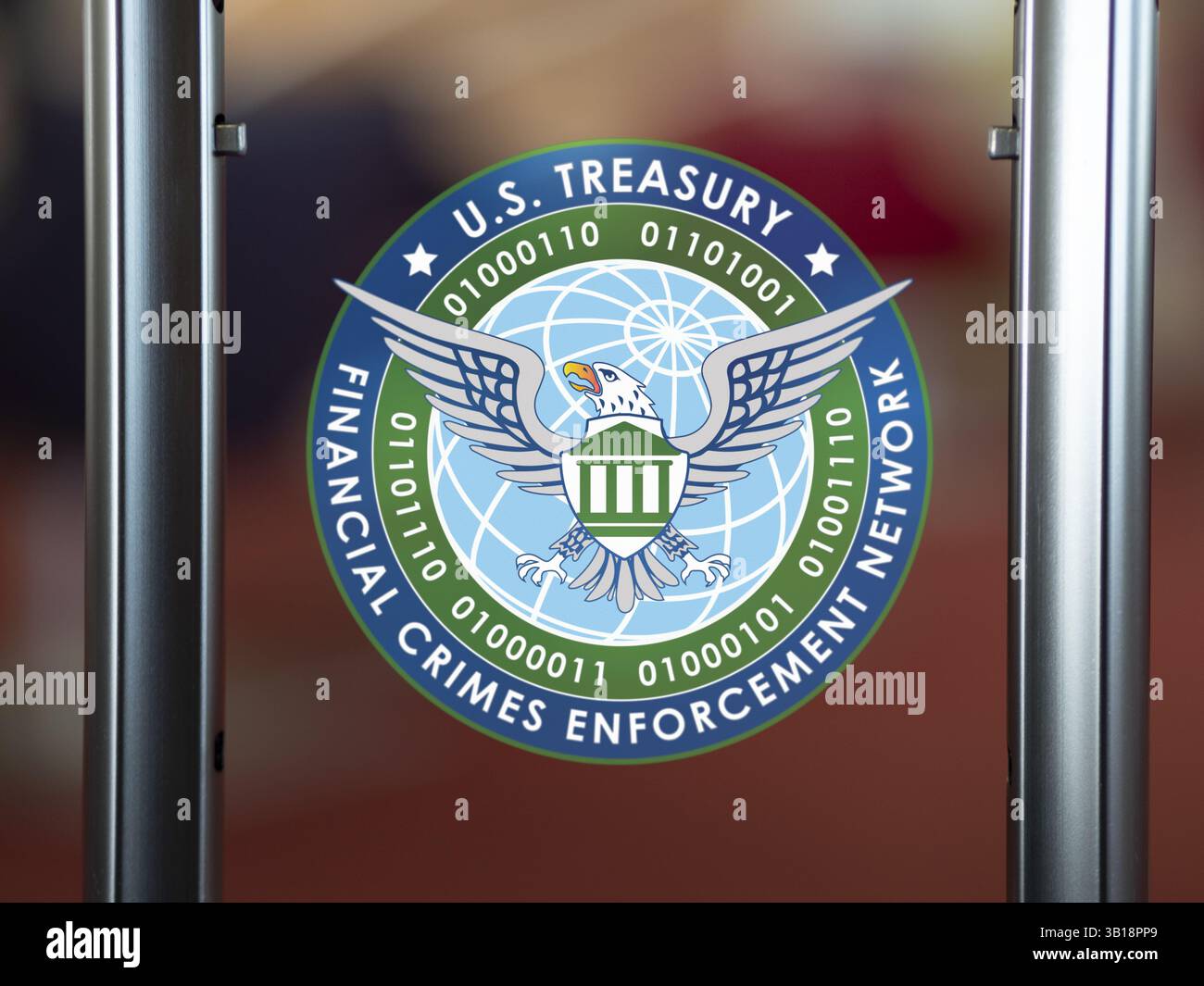 US Treasury financial crimes enforcement Network emblem, on a window Stock Photo