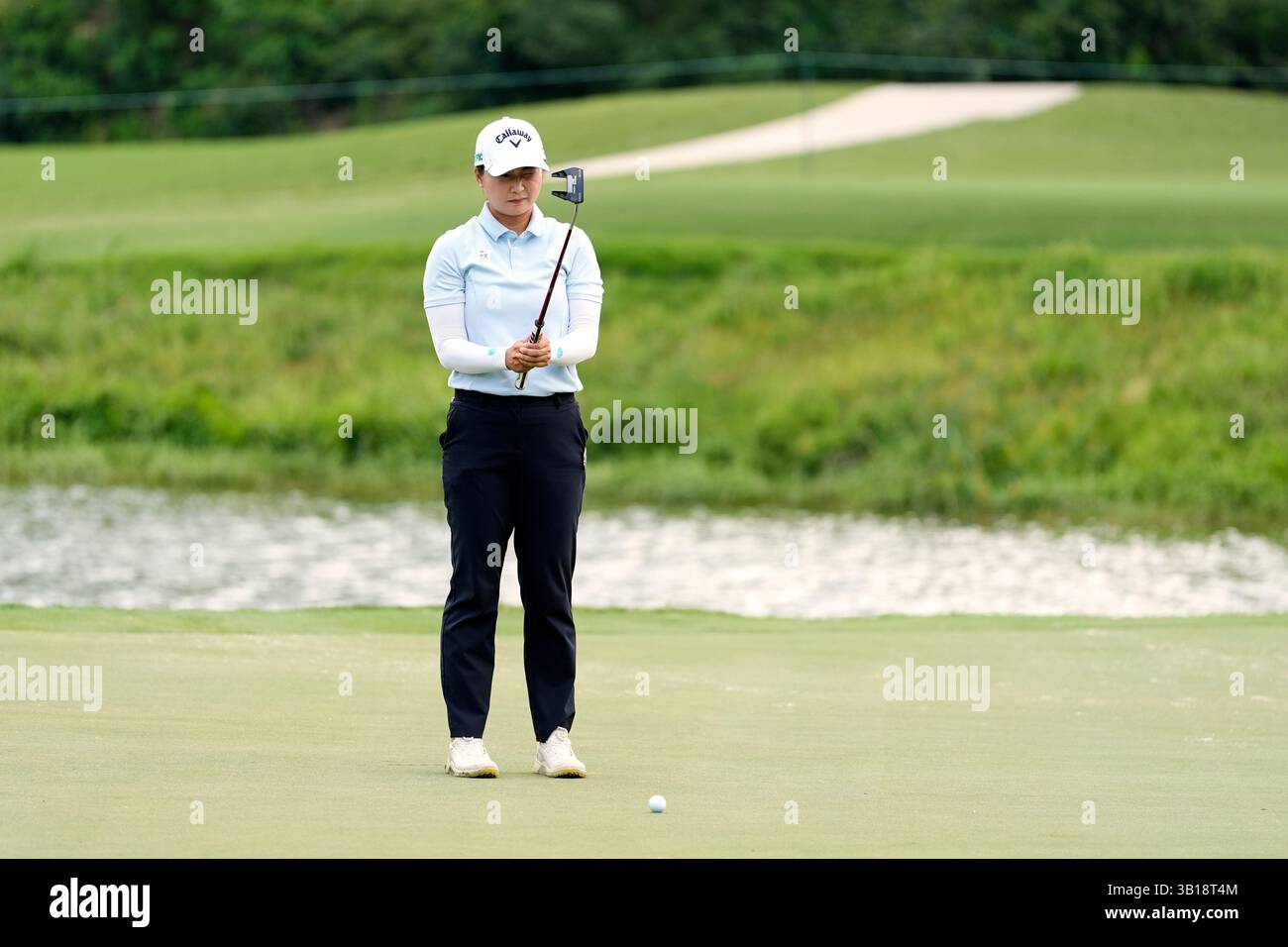 Jeongeun Lee5, of South Korea, prepares to putt on the fifth hole ...