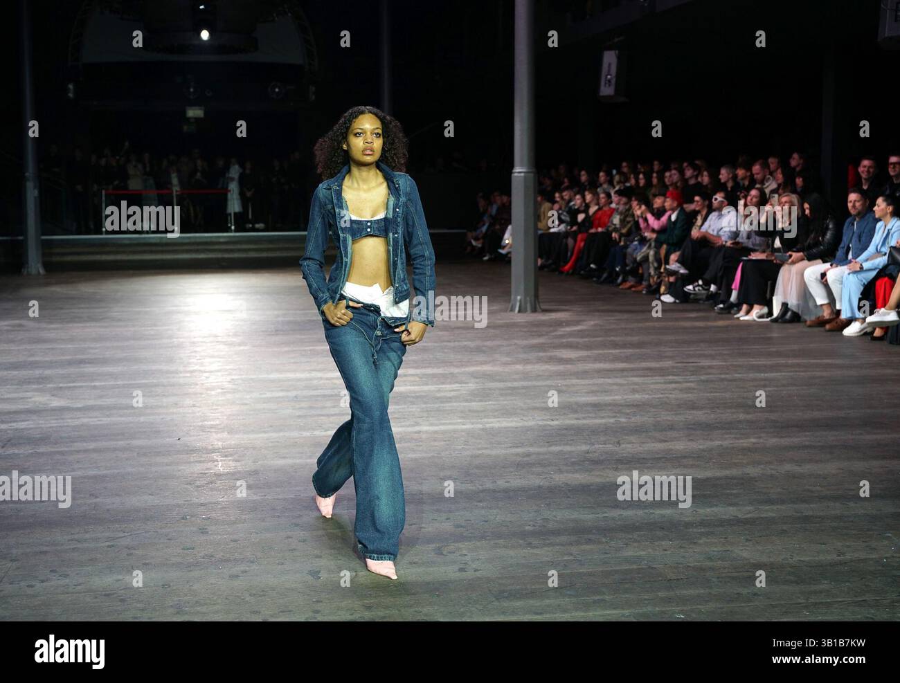 Prague, Czech Republic. 25th Apr, 2025. A model presents a creation by ...