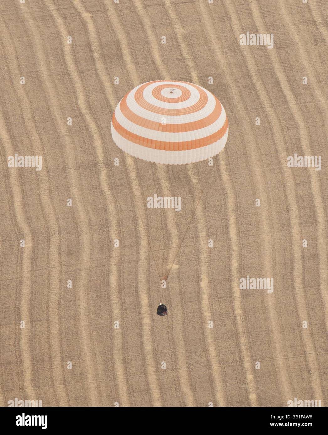 Sept. 25, 2010 - Arkalyk, Kazakhstan - The Soyuz TMA-18 spacecraft is seen as it lands with Expedition 24 Commander Alexander Skvortsov and Flight Engineers Tracy Caldwell Dyson and Mikhail Kornienko near the town of Arkalyk, Kazakhstan on Saturday. Russian Cosmonauts Skvortsov and Kornienko and NASA Astronaut Caldwell Dyson, are returning from six months onboard the International Space Station where they served as members of the Expedition 23 and 24 crews. (Credit Image: © Bill Ingalls/NASA/ZUMApress.com) Stock Photo