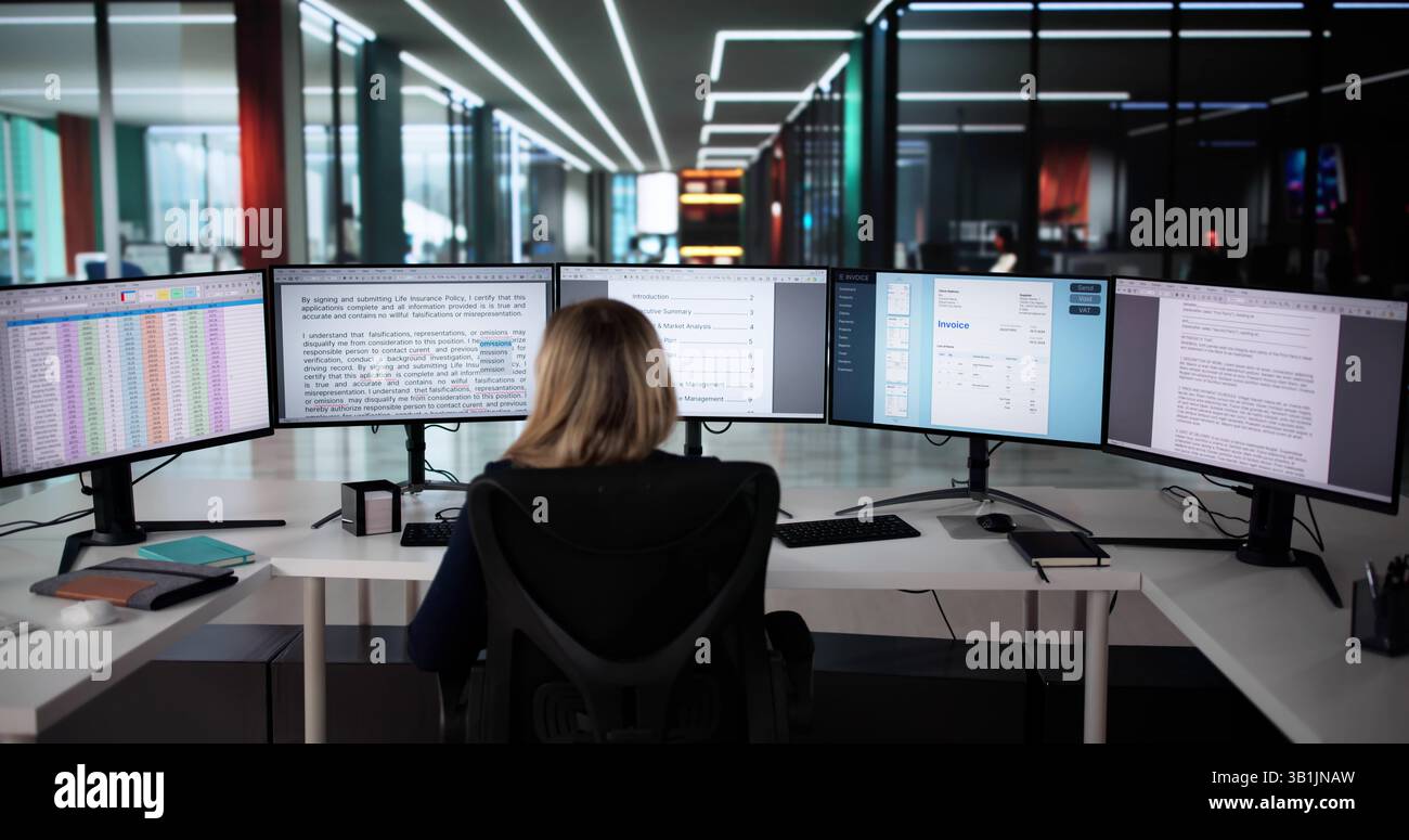 The Woman Correcting Mistakes On The Computer Screen: Editing Documents Stock Photo