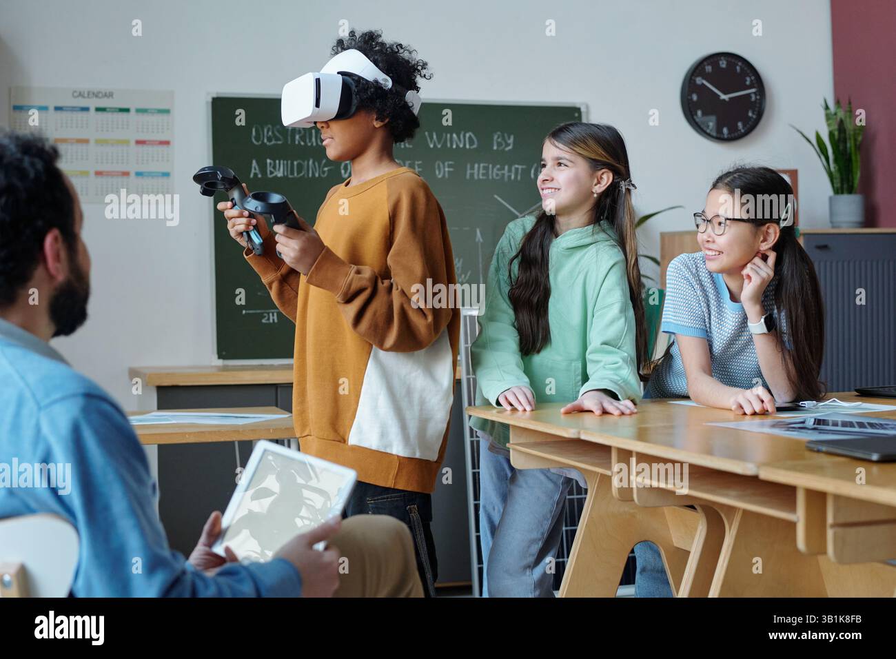 Students Experiencing Virtual Reality in Classroom Stock Photo