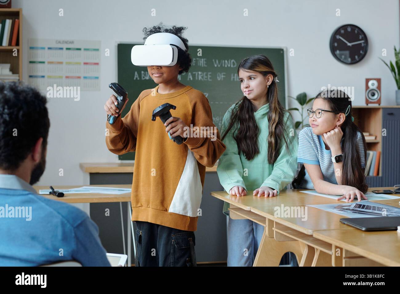 Experiencing Virtual Reality in Classroom Setting Stock Photo