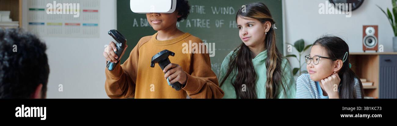 Experiencing Virtual Reality in Classroom Environment Stock Photo