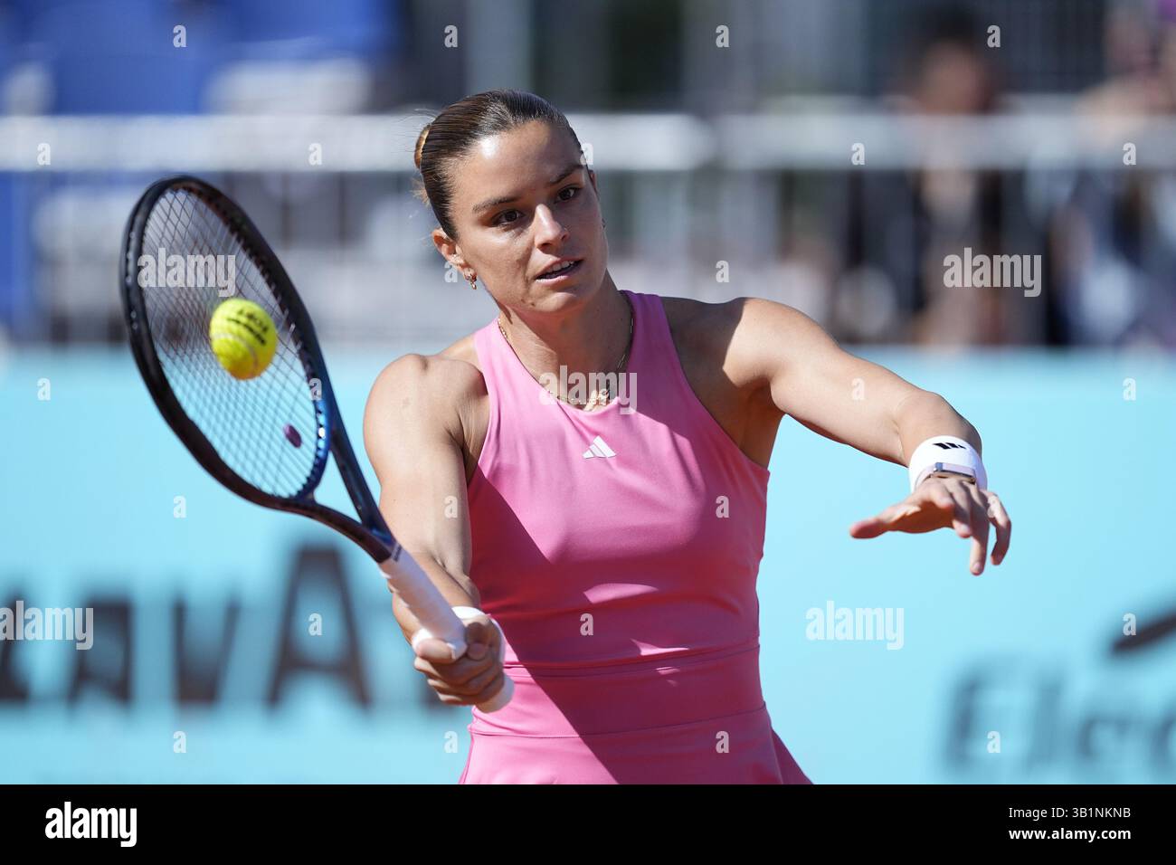 Maria Sakkari of Greece in action against Magda Linette of Poland