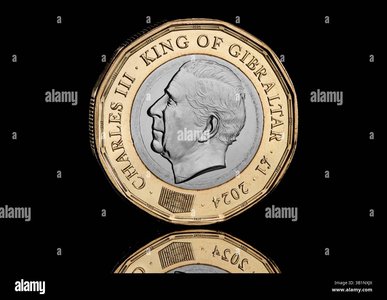 The First Gibraltar 12 Sided Bimetallic One Pound Coin Featuring A The First Gibraltar 12 Sided Bimetallic One Pound Coin Featuring A