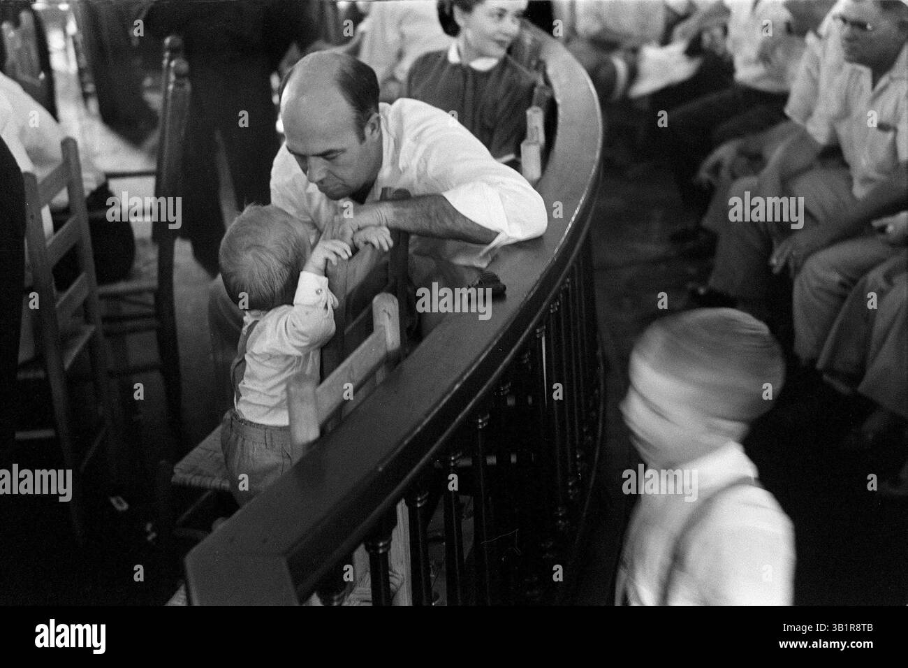 Sept. 1, 1955 - Sumner, MS, U.S. - J.W. Milam plays with his son ...