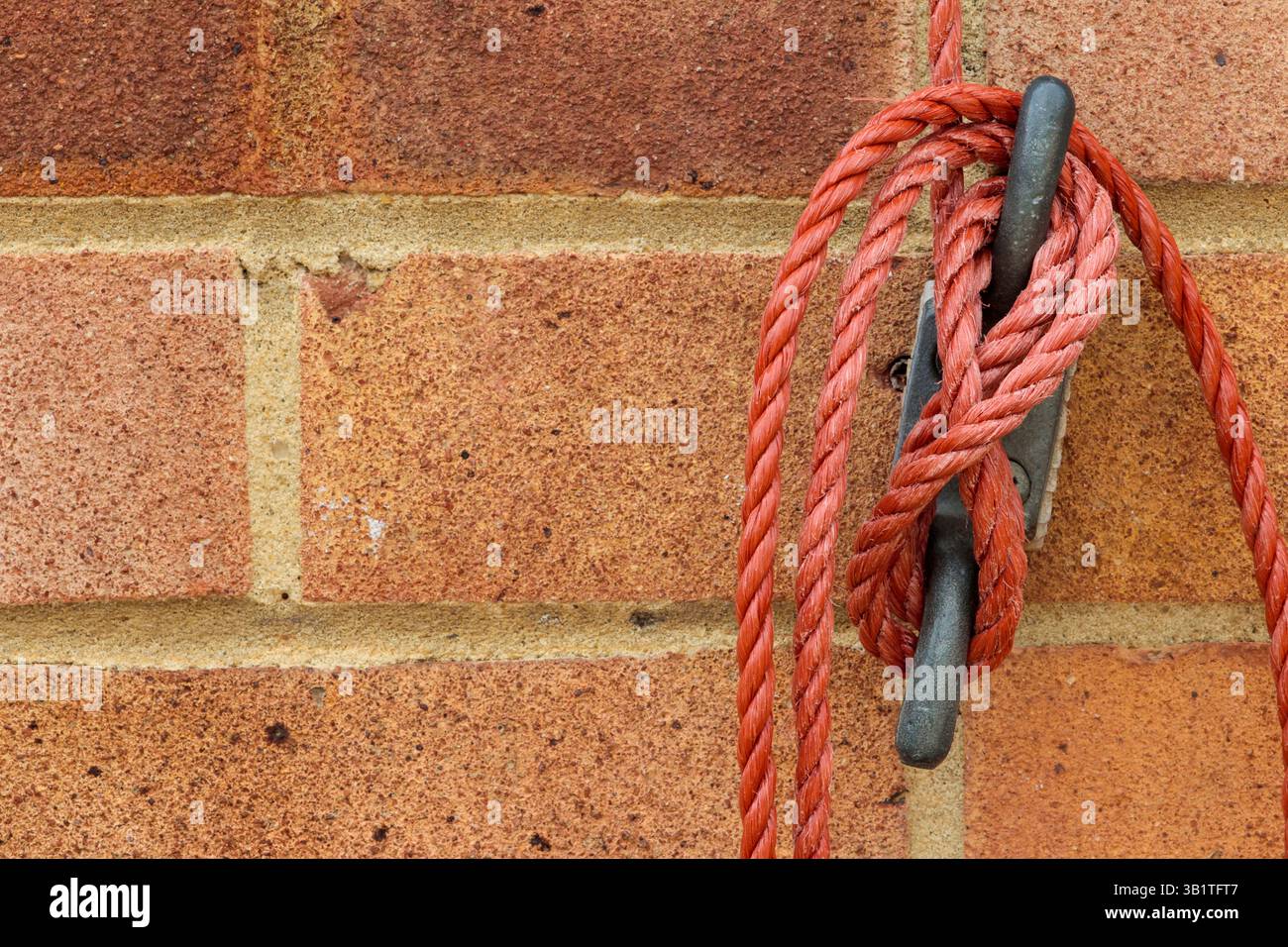 Washing line rope wound on double hook hi-res stock photography and ...