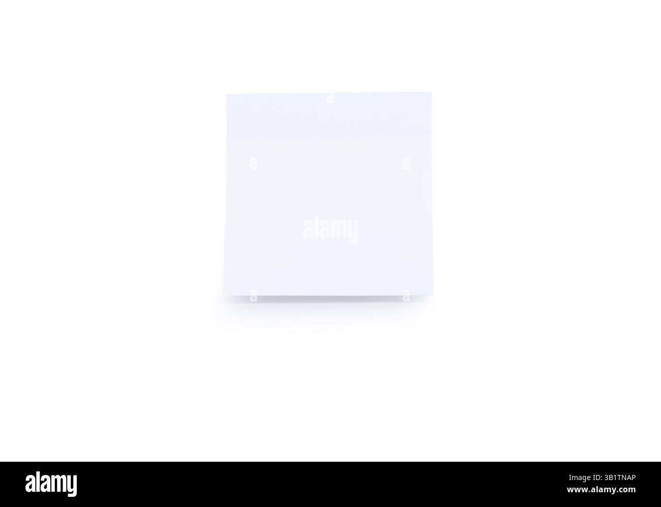 White sticky note stickers stuck on white background Stock Photo