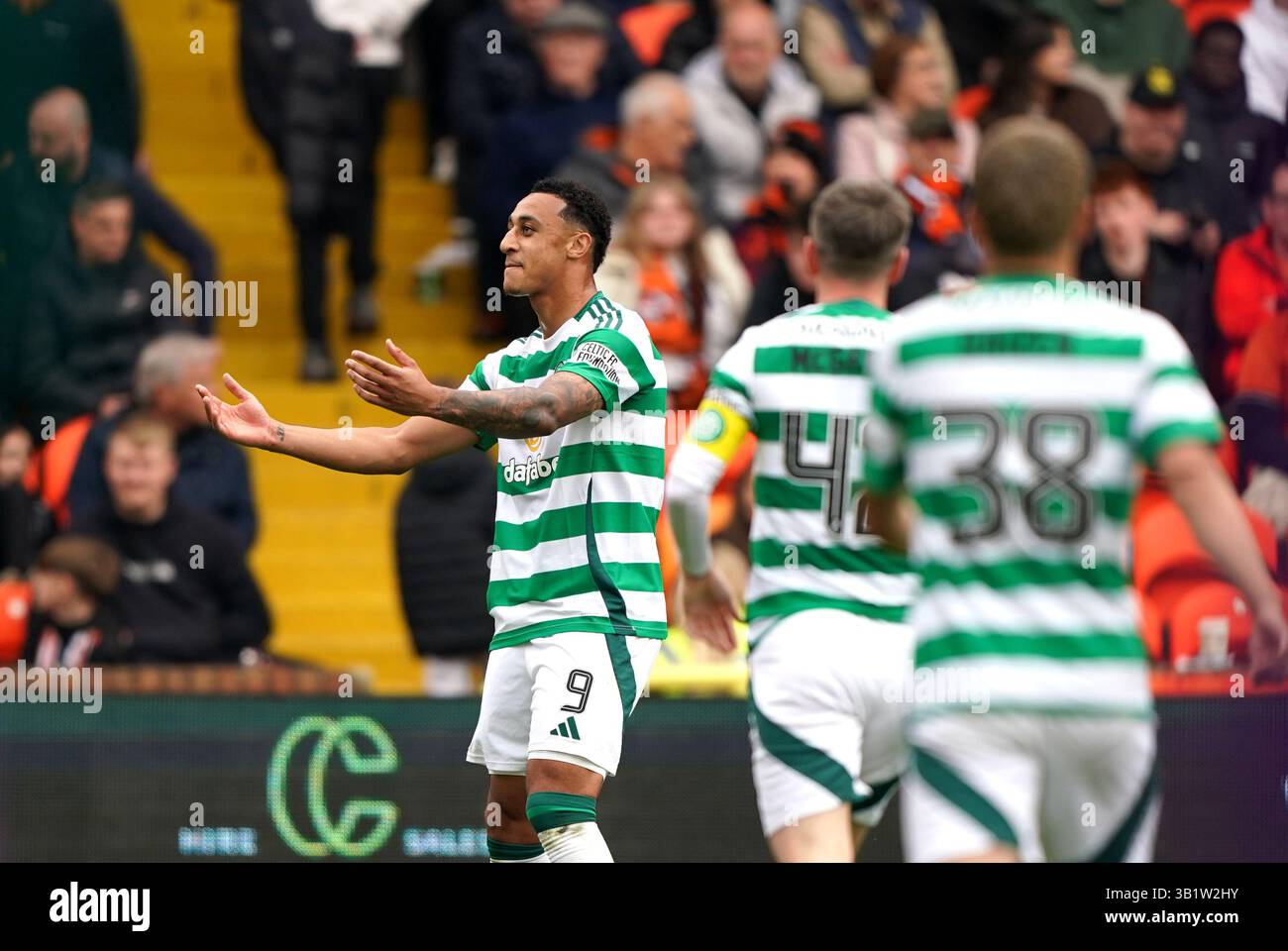 Celtic's Adam Idah celebrates scoring their side's fifth goal of the