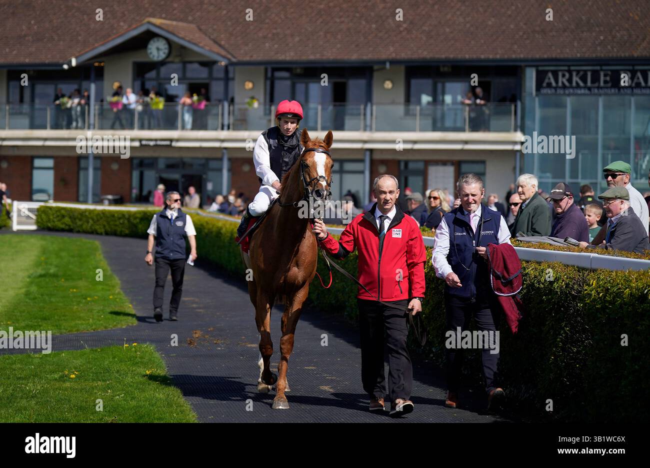 Jockey Ryan Moore on Kyprios in the parade ring after winning the Bar ...