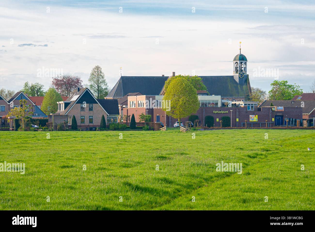 View of a church and houses in the village of Waarder, province of Zuid-Holland, Netherlands Stock Photo