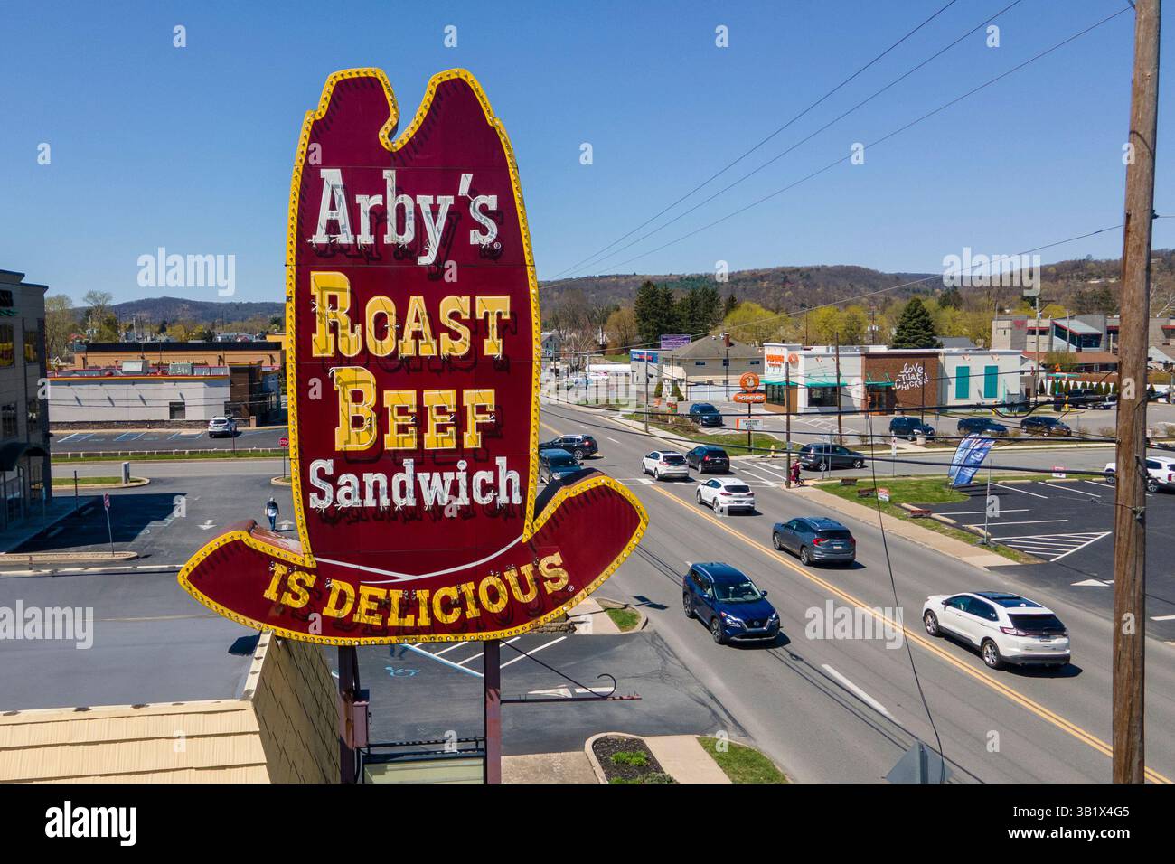An Arby's fast food restaurant with a vintage 41-foot tall, neon 10 ...