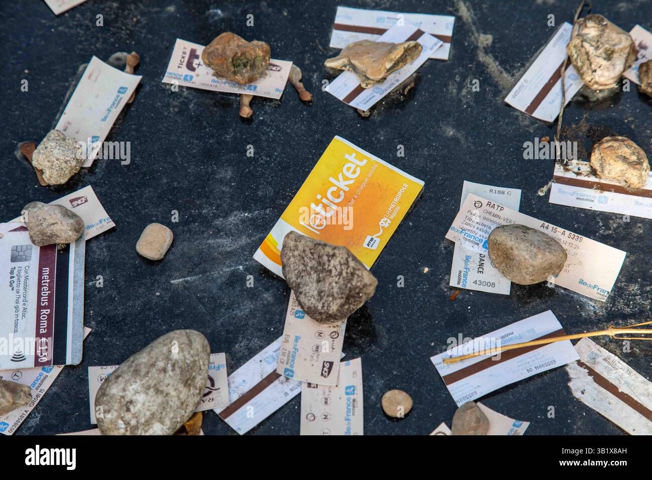 Metro tickets on the grave of François Truffaut in Montmartre Cemetery, officially Cimetière du Nord, in Paris, France Stock Photo