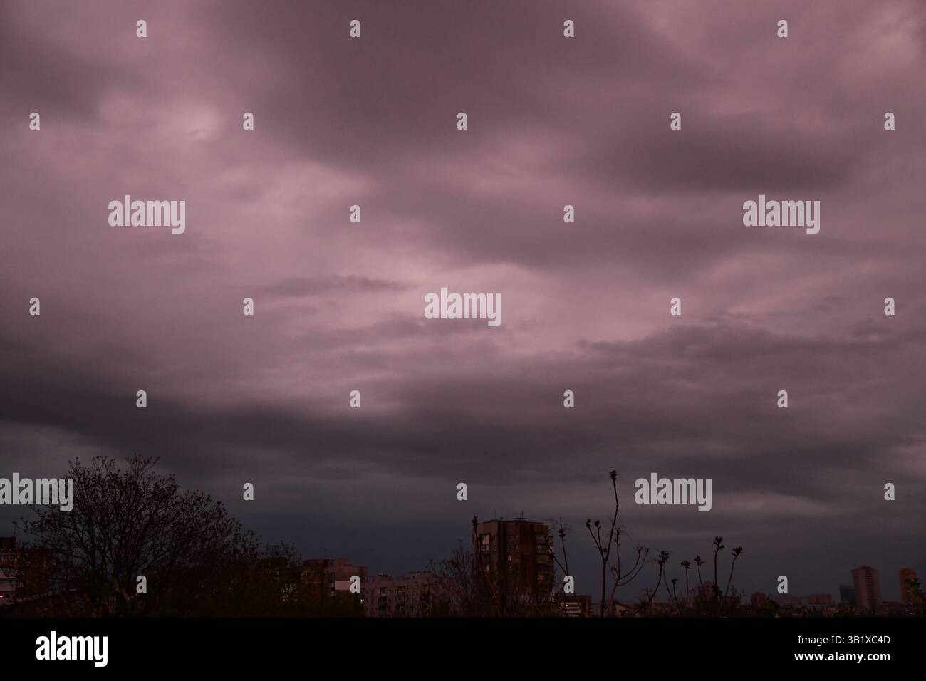 Thunderous dark sky with black clouds and flashing lightning. Panoramic ...