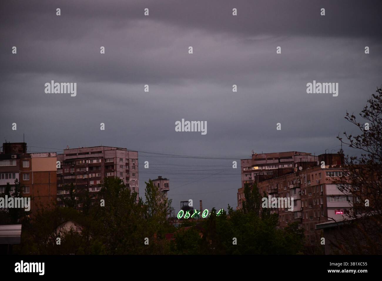 Thunderous dark sky with black clouds and flashing lightning. Panoramic ...