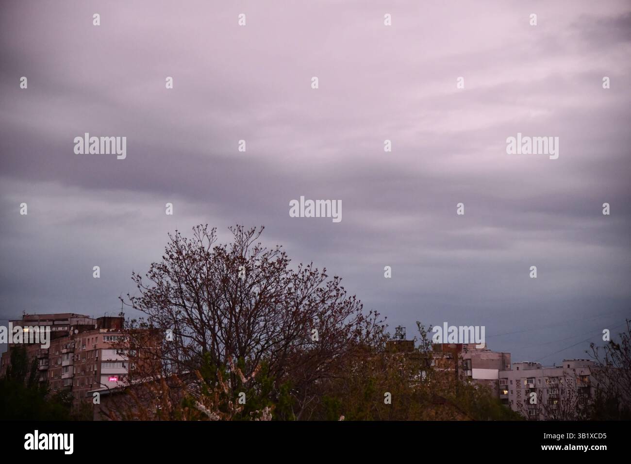 Thunderous dark sky with black clouds and flashing lightning. Panoramic ...