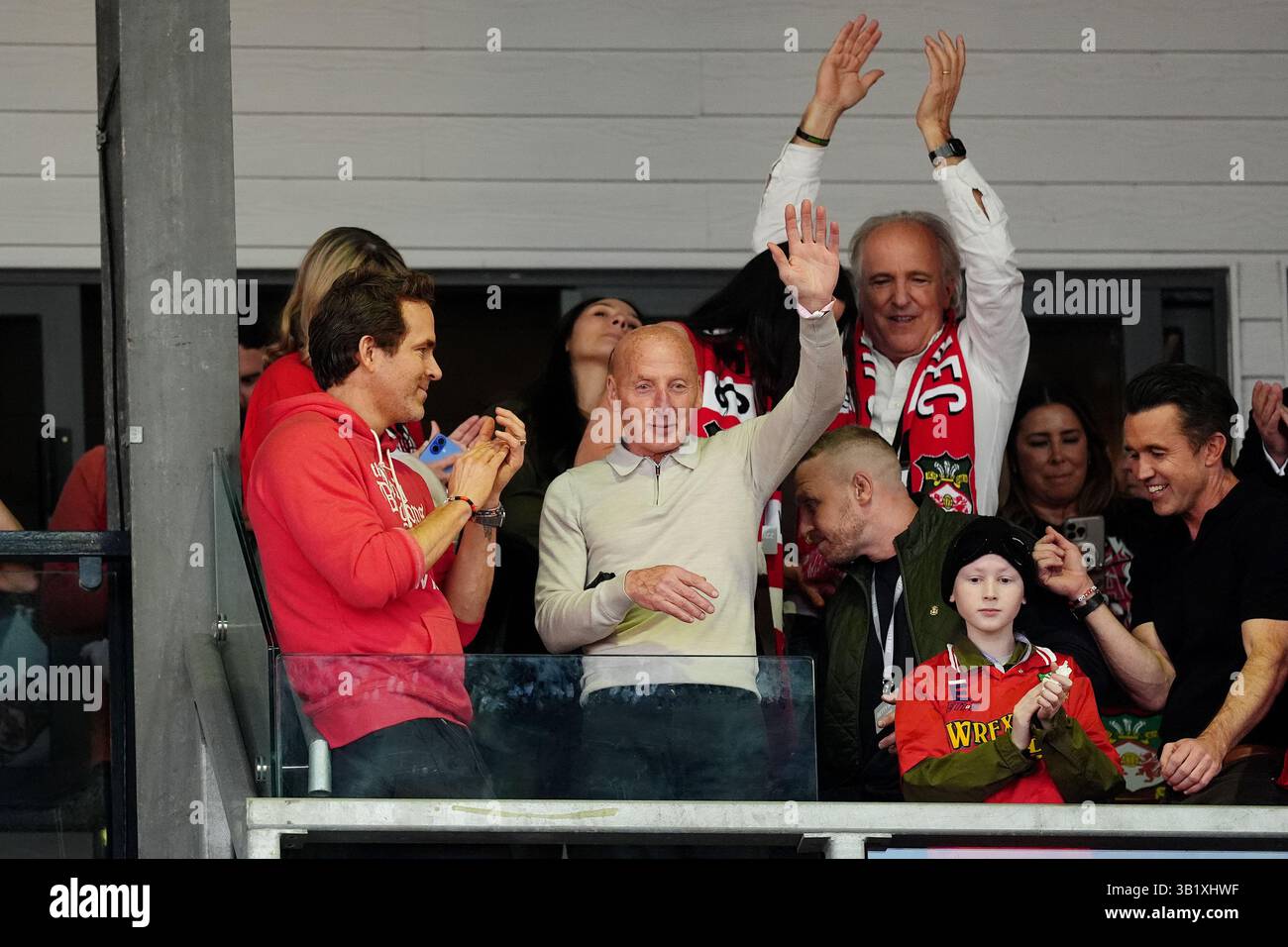 Wrexham co-owner Ryan Reynolds (left) and Mickey Thomas celebrate at the full time whistle after winning the Sky Bet League One match at SToK Racecourse, Wrexham. Picture date: Saturday April 26, 2025. Stock Photo