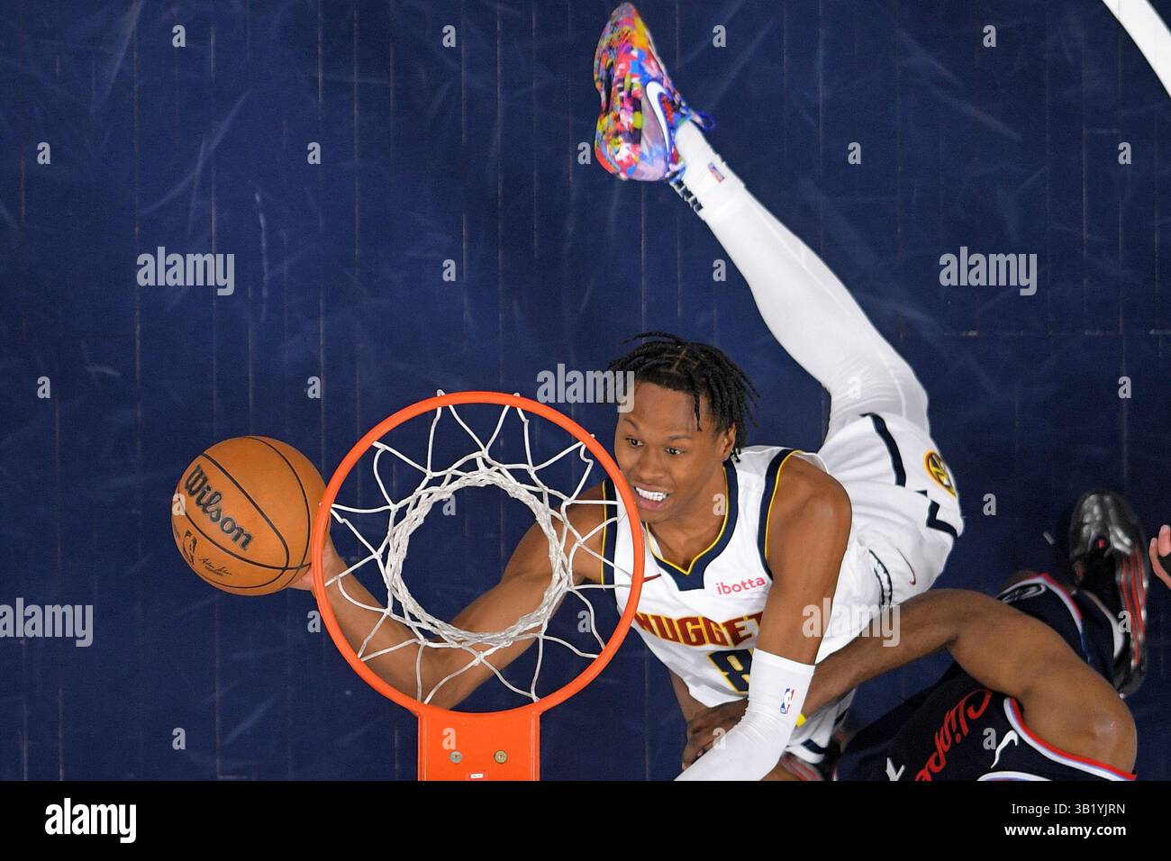 Denver Nuggets forward Peyton Watson shoots during the second half in