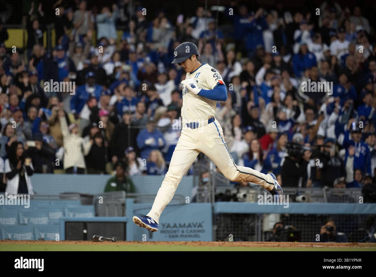 Los Angeles Dodgers' Shohei Ohtani scores on an RBI single by Freddie ...