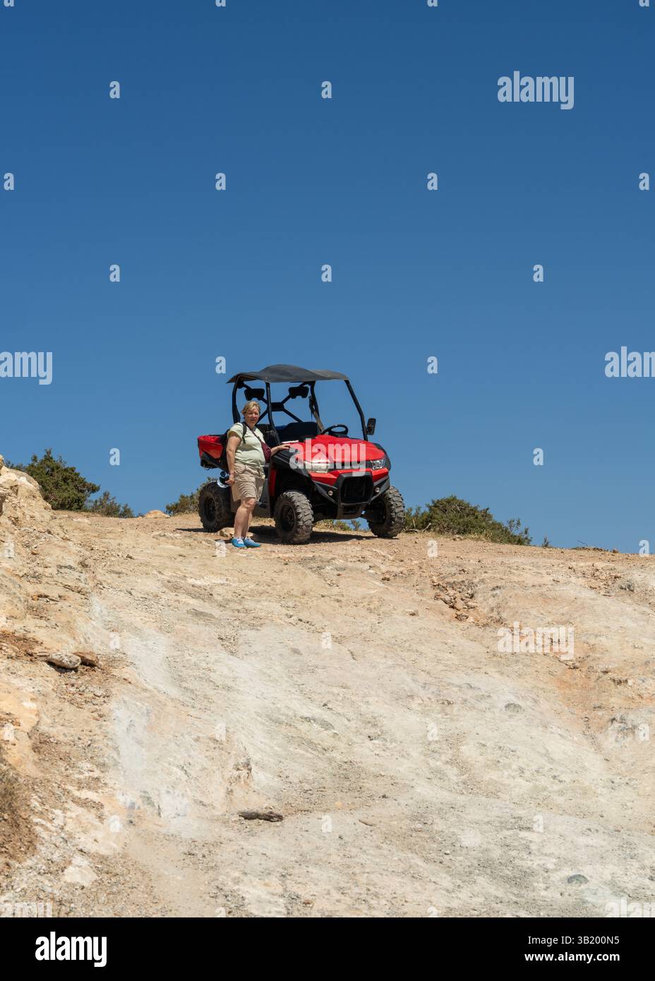 Woman next off road hires stock