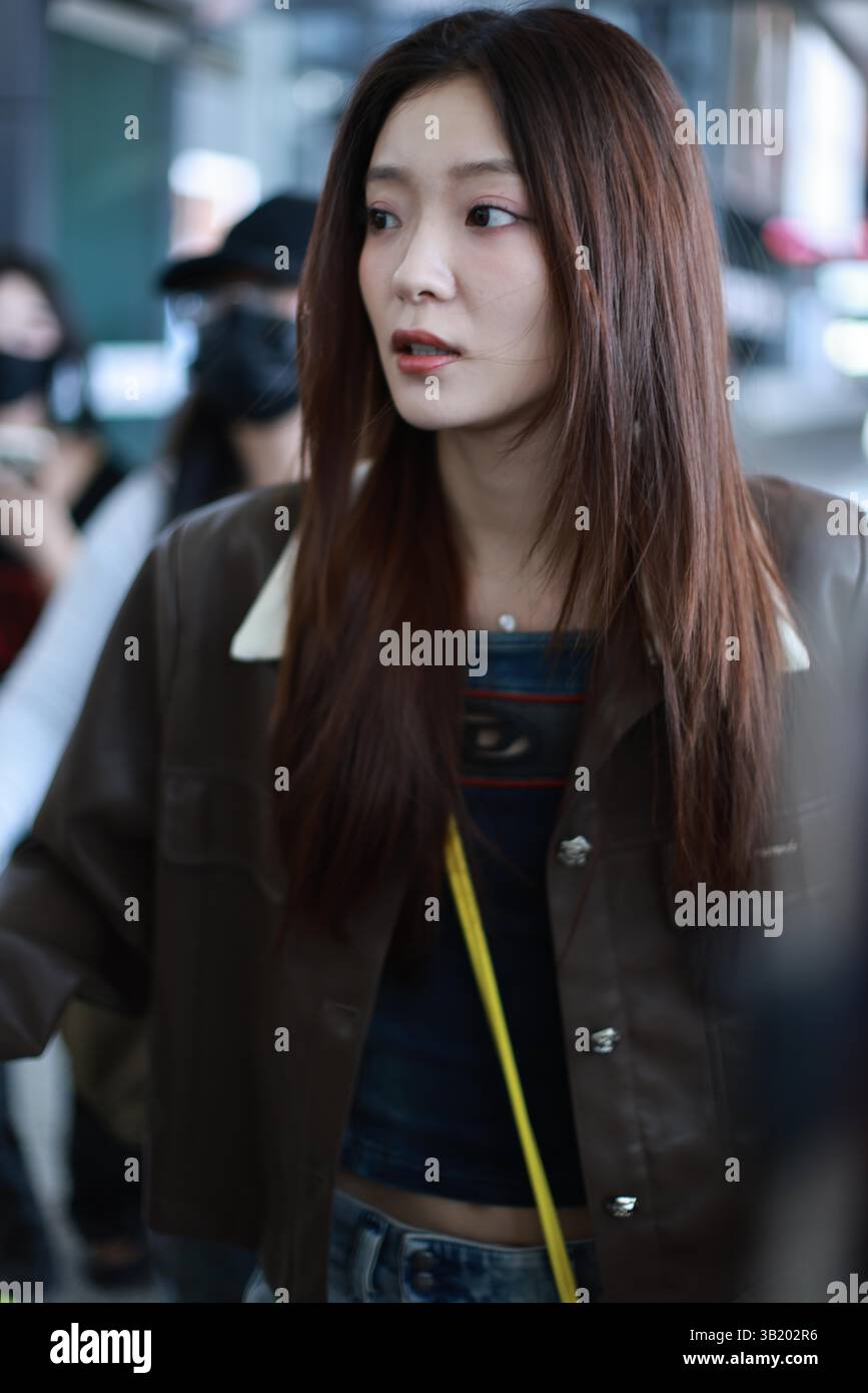 Chinese actress Luo Yutong appears at the airport in Shanghai, China ...