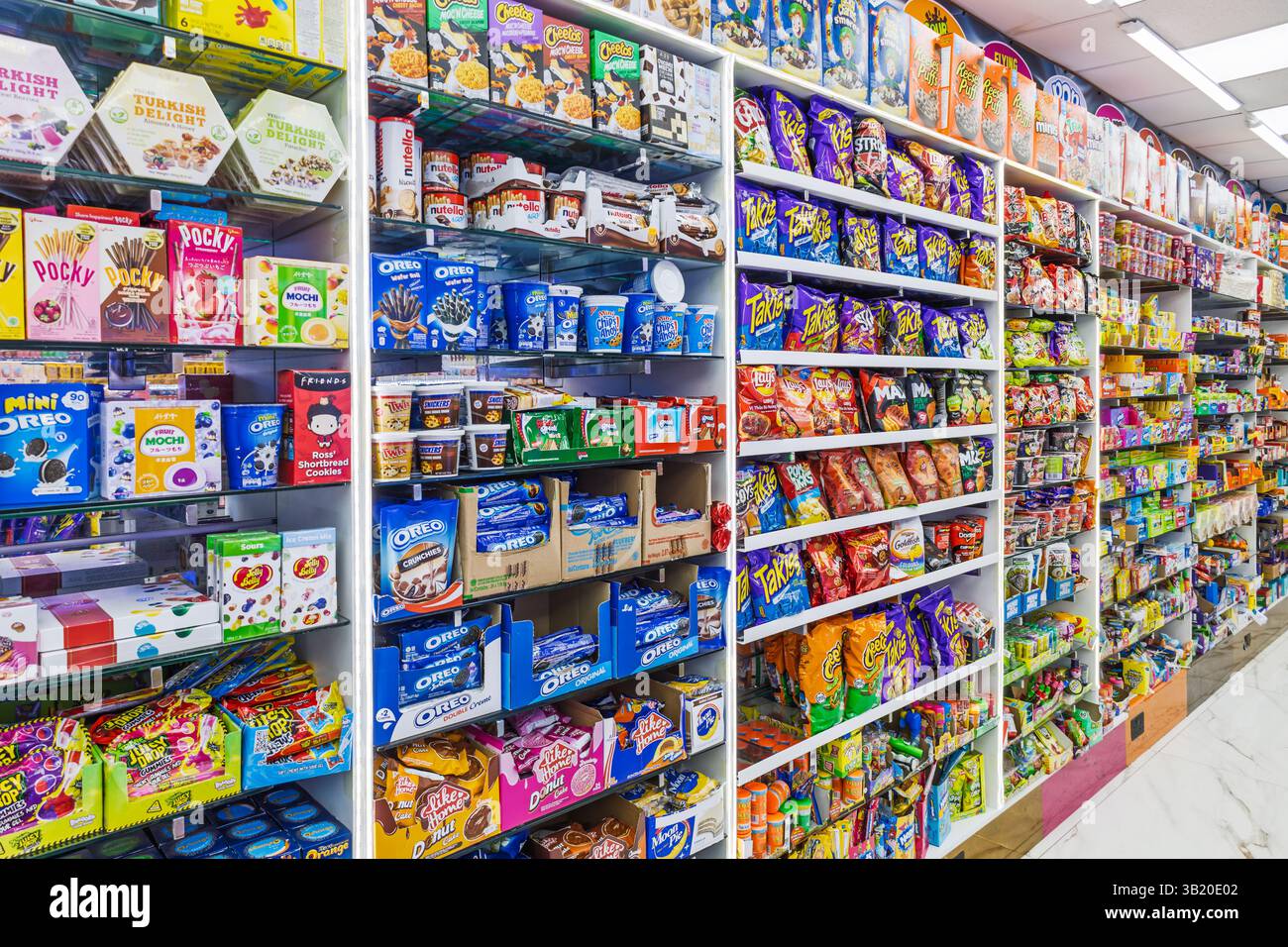 Grocery Store Shelves Stocked with an Sweet Treats and Snacks. London ...