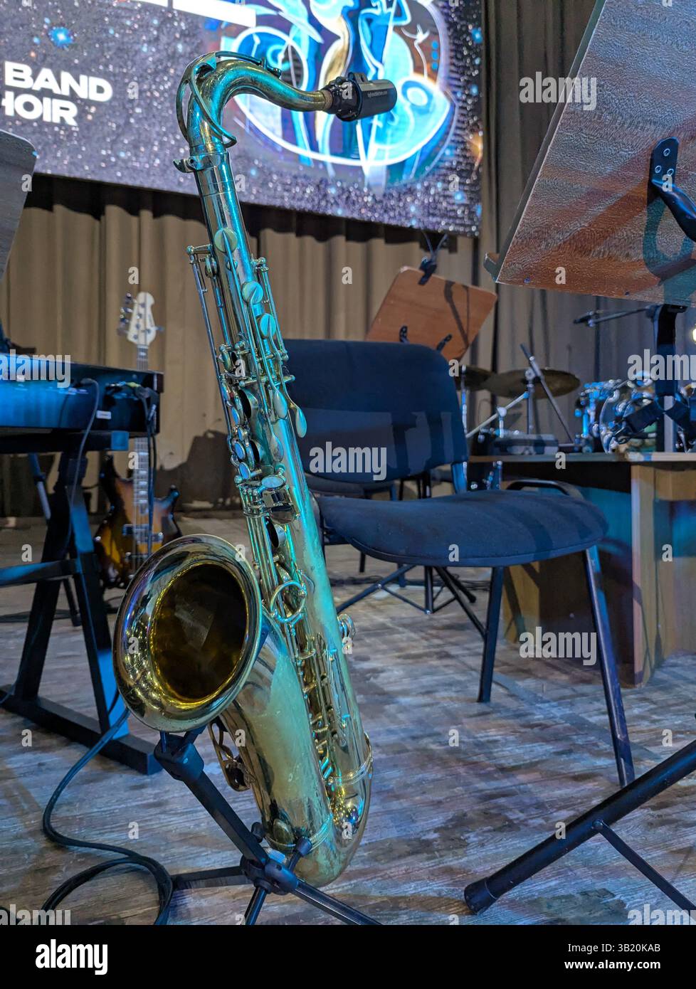Saxophone Concert Program saxophone on a stand on stage before a concert Stock Photo - Alamy