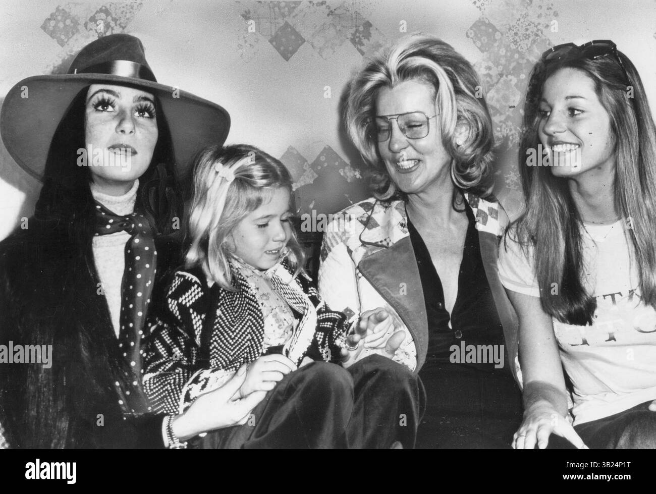 Jan. 19, 2011 - CHER with sister GEORGIANNE LaPIERE , mother GEORGIA PELHAM and daugler and CHASTITY BONO at the grand opening of Grannie's Cabbage Patch boutique owned by Cher's mother, Georgiann 12-13-1974.Supplied by  -  Photos, inc..1974(Credit Image: © Globe Photos/ZUMAPRESS.com) Stock Photo