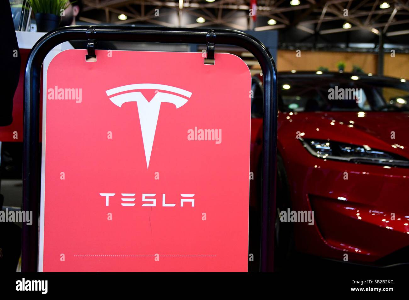 Tesla car brand exhibition poster seen at the Lyon fair. The Lyon Fair ...