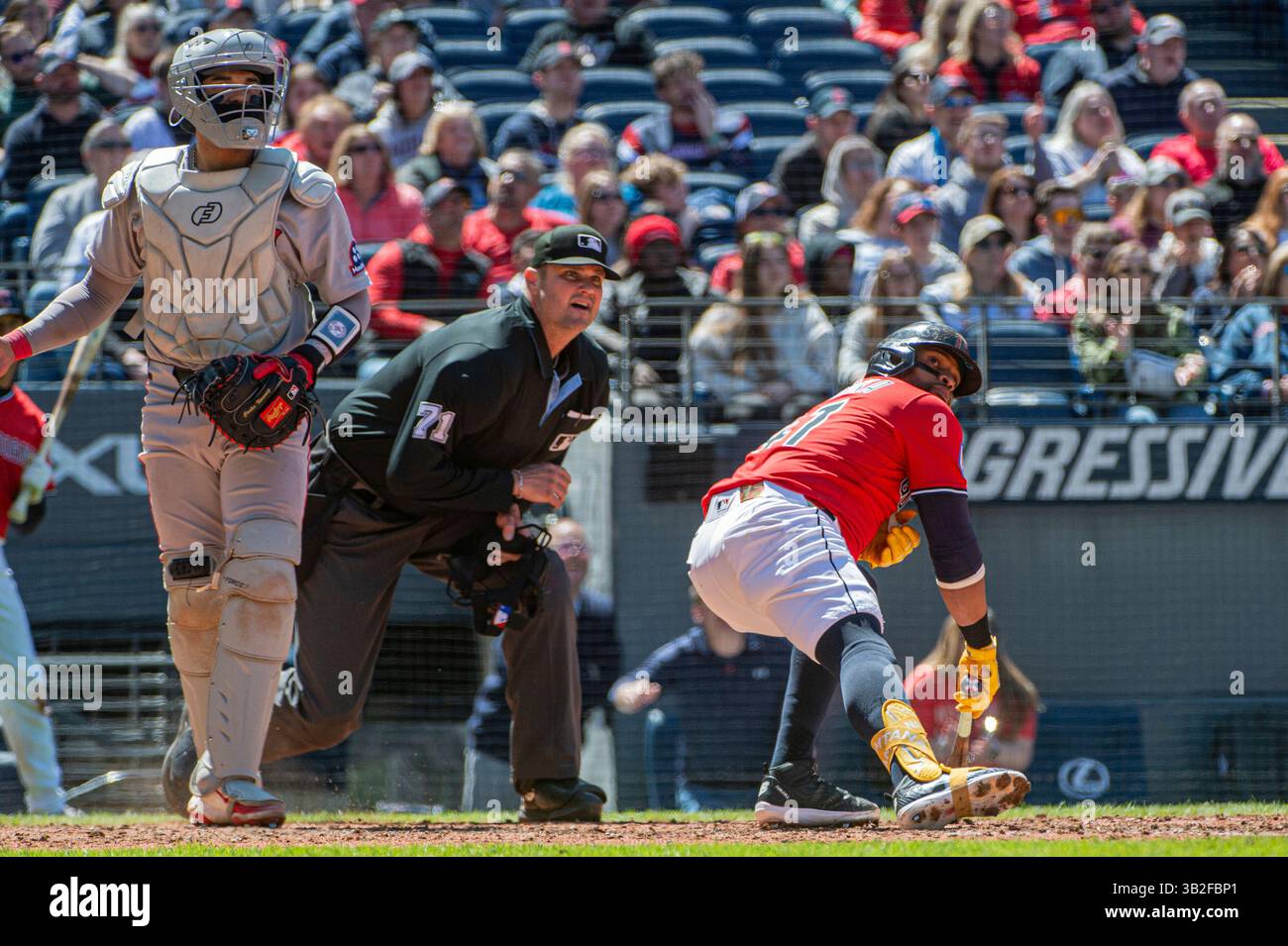Boston Red Sox's Carlos Narvaez, left, umpire Jordan Baker, center, and