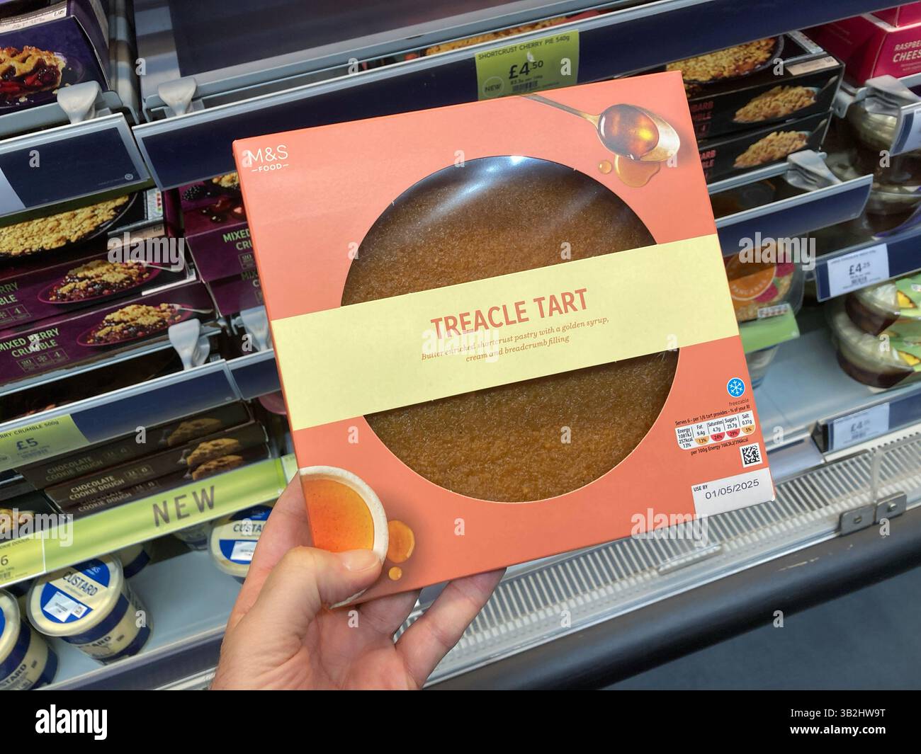 Treacle Tart for sale at Marks & Spencer in a chilled cabinet, UK - Smartphone Captured Stock Image