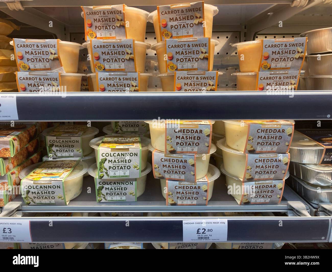 Choice of Individual Ready Meals for sale at Marks & Spencer in a chilled cabinet, selection of Mashed Potato options, UK - Smartphone Captured Stock Image